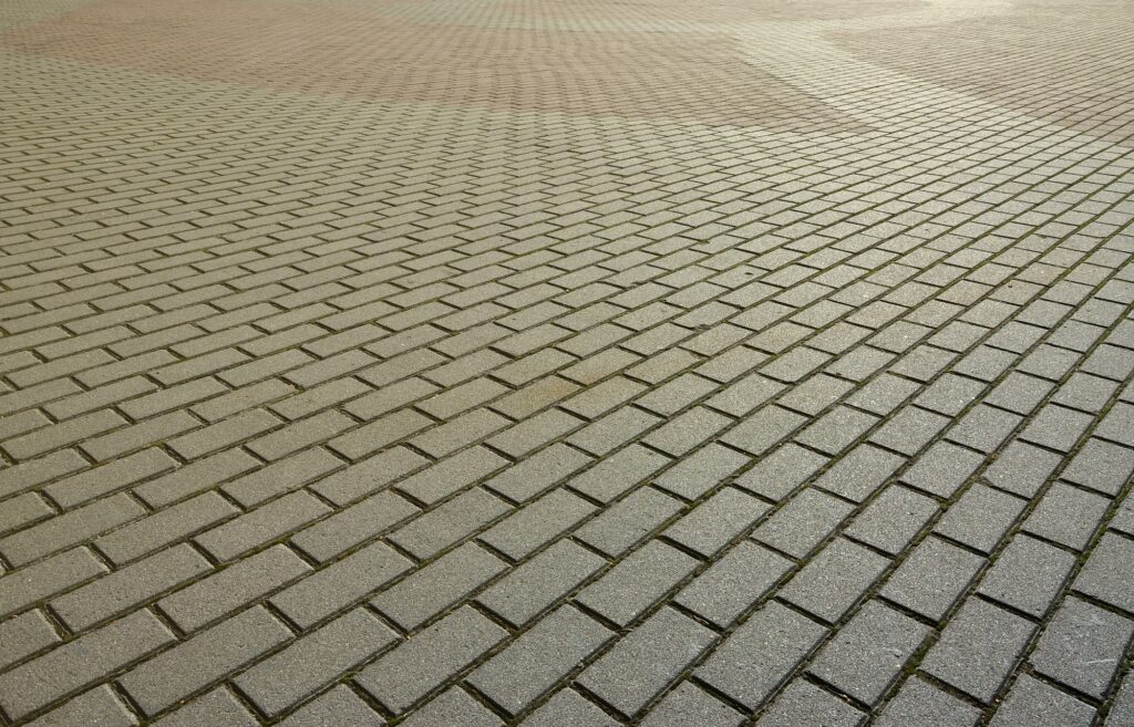 A large area, covered with a quality paving stone in daylight